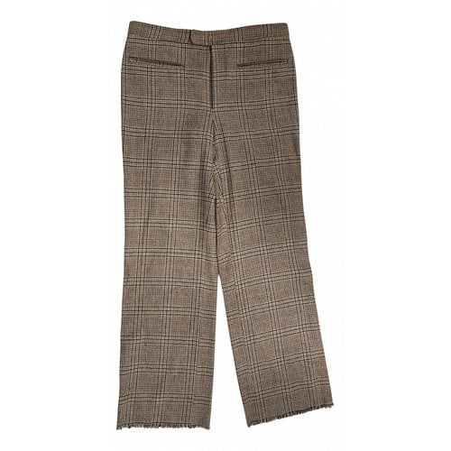 Pre-owned Moschino Wool Trousers In Grey