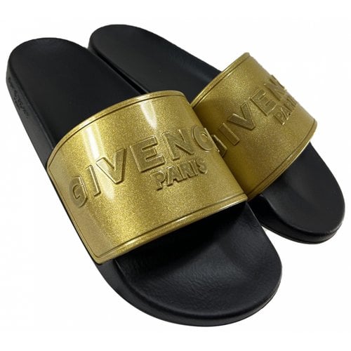 Pre-owned Givenchy Flip Flops In Gold