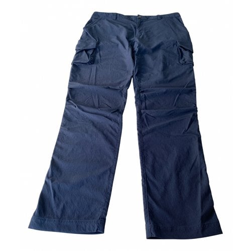 Pre-owned 66 North Trousers In Blue