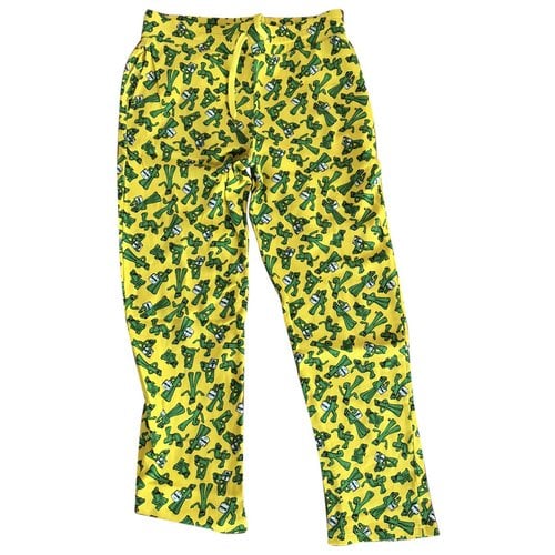 Pre-owned Moschino Trousers In Yellow