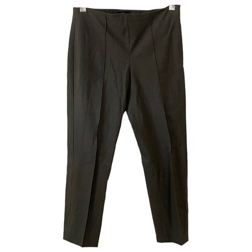 Pre-owned Theory Trousers In Green