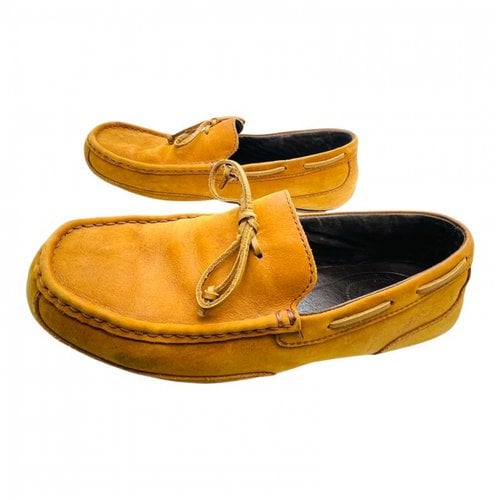 Pre-owned Ugg Leather Flats In Yellow