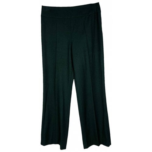 Pre-owned Akris Wool Trousers In Green