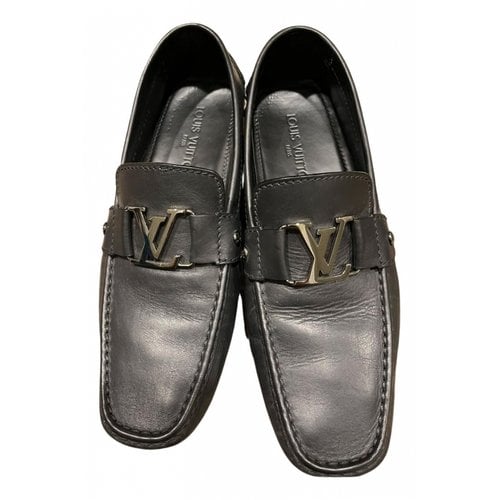 Pre-owned Louis Vuitton Montaigne Leather Flats In Black