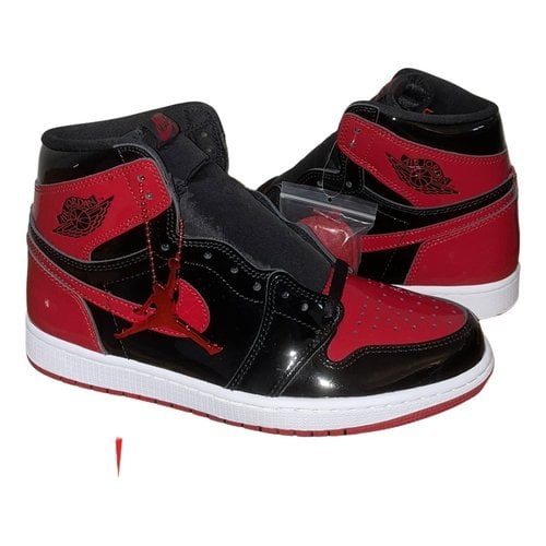 Pre-owned Jordan 1 Patent Leather Trainers In Red