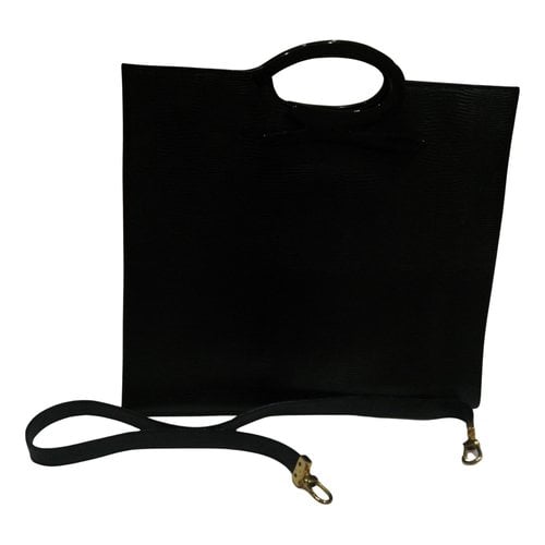 Pre-owned Genny Leather Handbag In Black