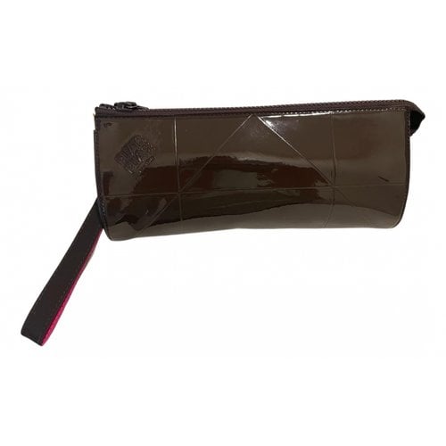 Pre-owned Pleats Please Leather Clutch Bag In Brown