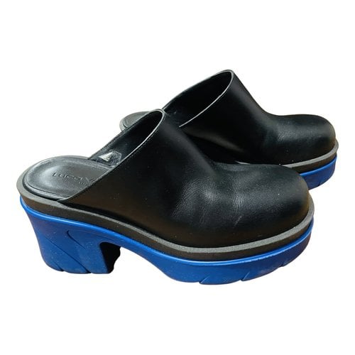 Pre-owned Luca Valentini Leather Mules & Clogs In Black