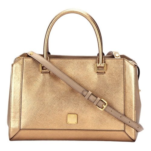 Pre-owned Mcm Patent Leather Handbag In Gold
