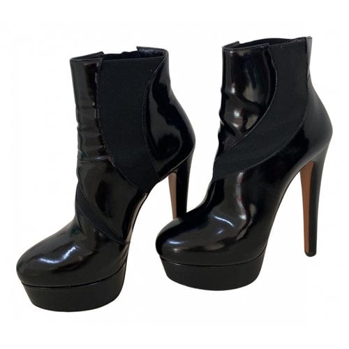 Pre-owned Alaïa Patent Leather Ankle Boots In Black
