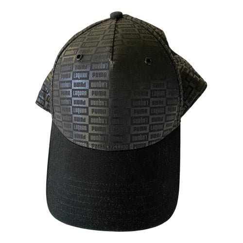 Pre-owned Laquan Smith Cap In Black