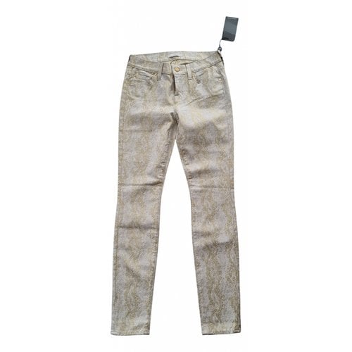 Pre-owned 7 For All Mankind Slim Pants In Gold