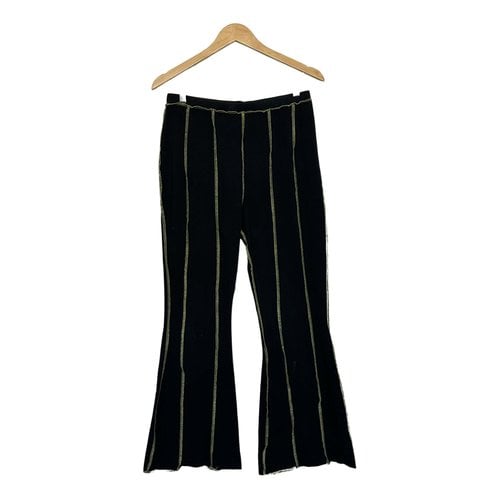 Pre-owned The Ragged Priest Trousers In Black