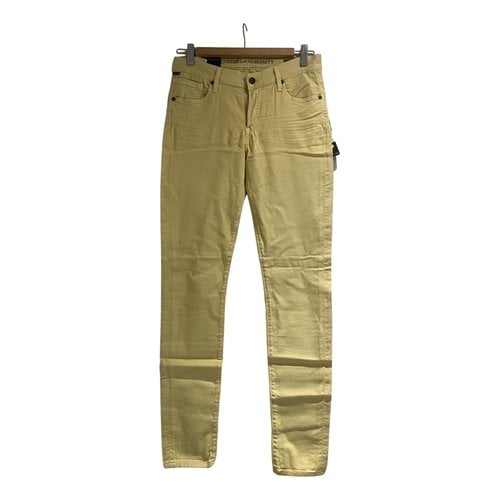 Pre-owned Citizens Of Humanity Slim Jeans In Yellow