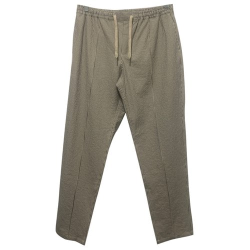 Pre-owned A Kind Of Guise Trousers In Grey