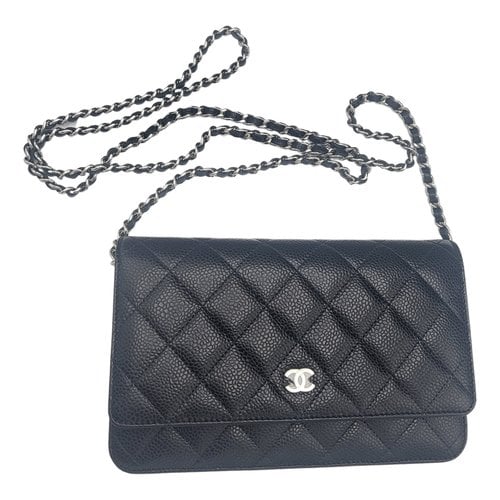 Pre-owned Chanel Wallet On Chain Timeless/classique Leather Crossbody Bag In Black