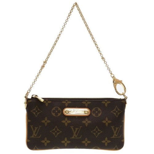 Pre-owned Louis Vuitton Cloth Handbag In Gold