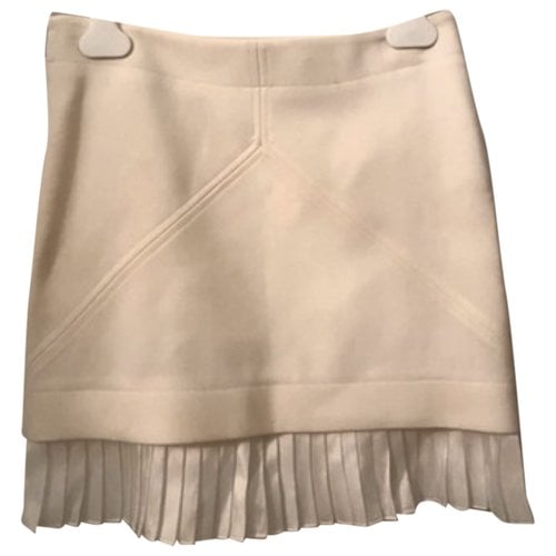 Pre-owned Courrèges Wool Mini Skirt In Ecru