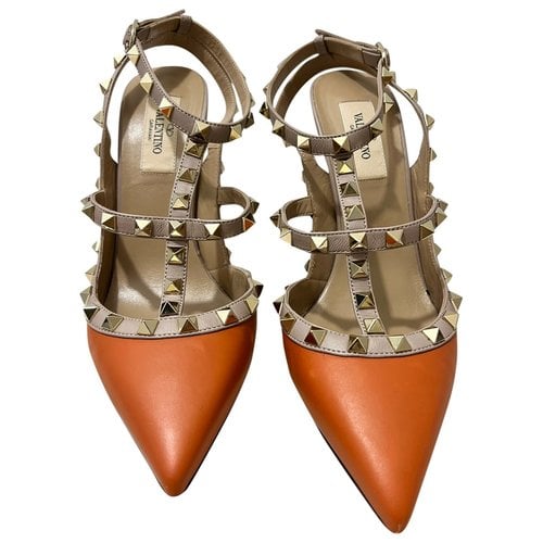 Pre-owned Valentino Garavani Rockstud Leather Heels In Orange