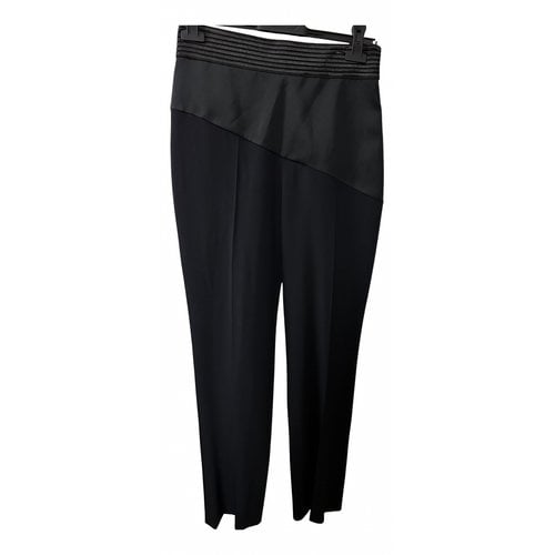 Pre-owned Emanuel Ungaro Cloth Trousers In Black