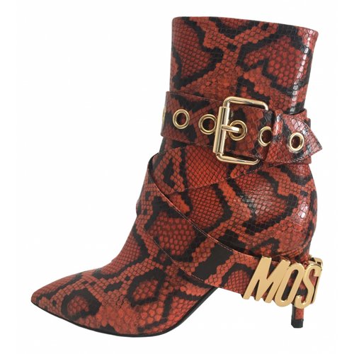 Pre-owned Moschino Leather Ankle Boots In Orange