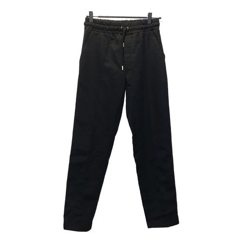Pre-owned Axel Arigato Wool Trousers In Black