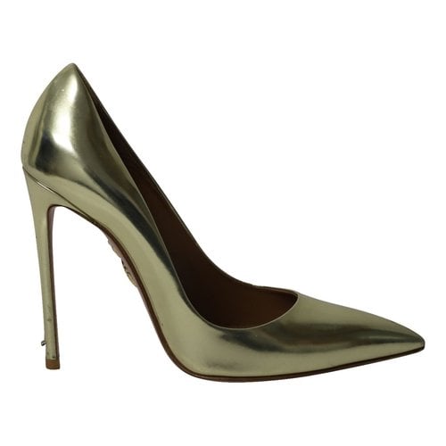 Pre-owned Aquazzura Patent Leather Heels In Gold