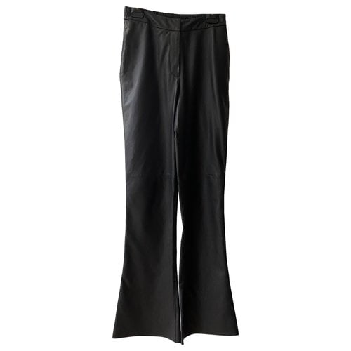 Pre-owned Humanoid Leather Trousers In Black