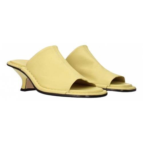 Pre-owned By Far Leather Mules In Yellow