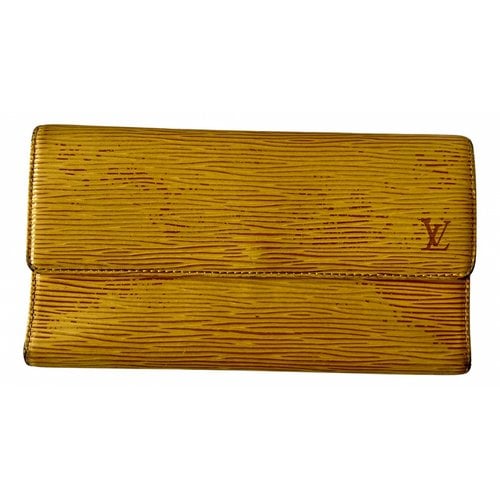 Pre-owned Louis Vuitton Lockme Leather Wallet In Yellow