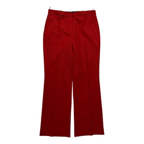Pre-owned Roberto Cavalli Wool Trousers In Red
