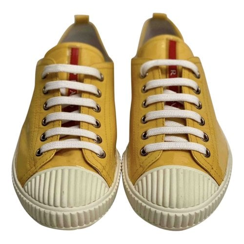Pre-owned Prada Patent Leather Trainers In Yellow