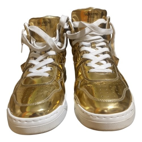 Pre-owned Valentino Garavani Rockstud Leather High Trainers In Gold
