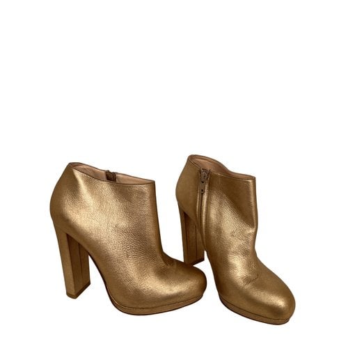 Pre-owned Christian Louboutin Leather Ankle Boots In Gold