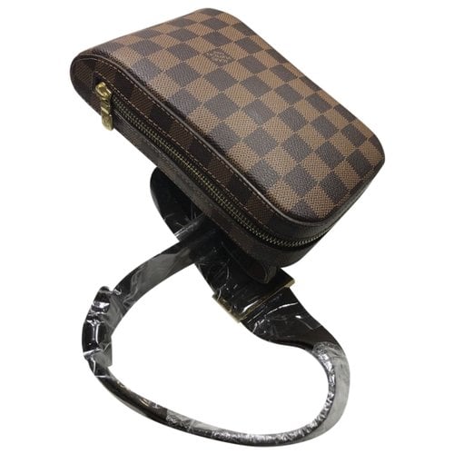 Pre-owned Louis Vuitton Geronimo Cloth Bag In Brown