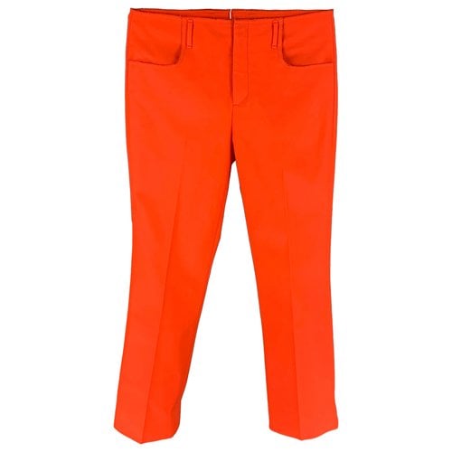 Pre-owned Acne Studios Trousers In Orange