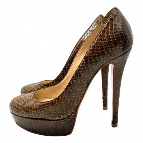 Pre-owned Christian Louboutin Bianca Python Heels In Brown