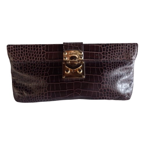 Pre-owned Dkny Patent Leather Clutch Bag In Brown