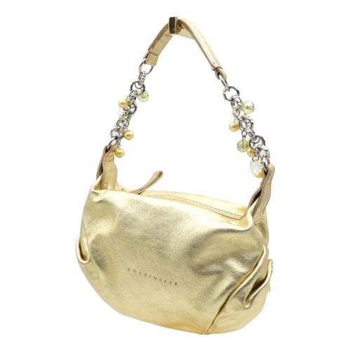 Pre-owned Coccinelle Leather Handbag In Gold