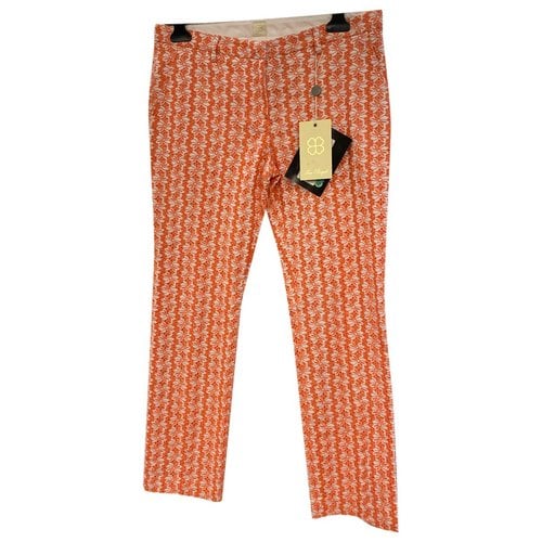 Pre-owned True Royal Trousers In Orange