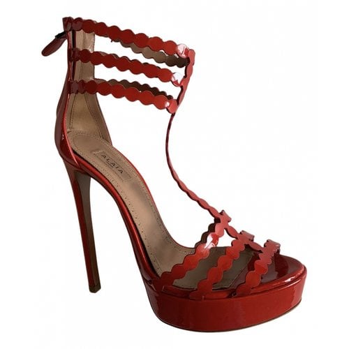 Pre-owned Alaïa Patent Leather Sandals In Red