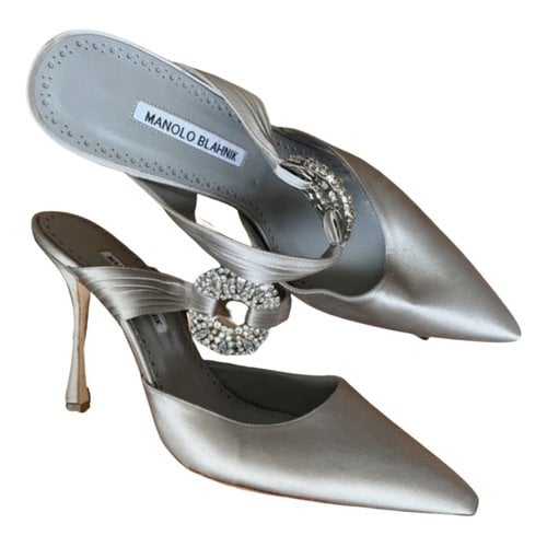 Pre-owned Manolo Blahnik Cloth Mules & Clogs In Silver