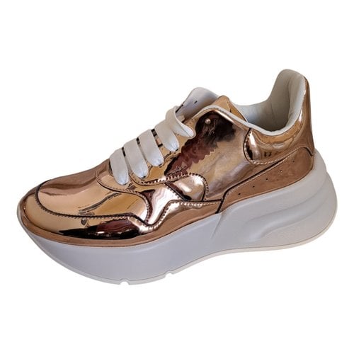 Pre-owned Alexander Mcqueen Patent Leather Trainers In Gold