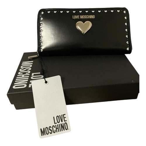 Pre-owned Moschino Love Patent Leather Wallet In Black