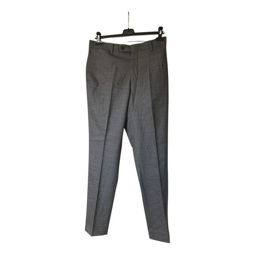 Pre-owned Calvin Klein Wool Trousers In Grey