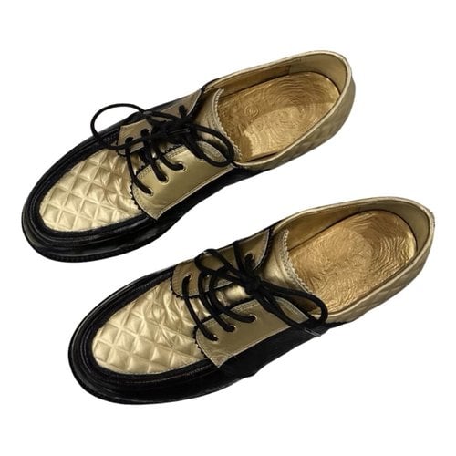 Pre-owned Chanel Leather Lace Ups In Gold