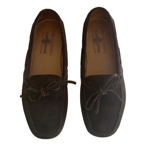 Pre-owned Carshoe Flats In Brown