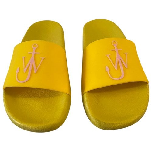 Pre-owned Jw Anderson Mules In Yellow