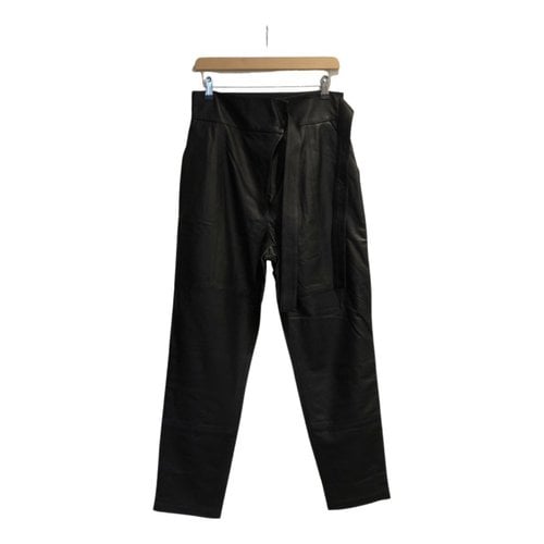Pre-owned Skiim Leather Trousers In Black