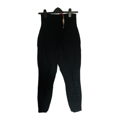 Pre-owned Aganovich Wool Trousers In Black